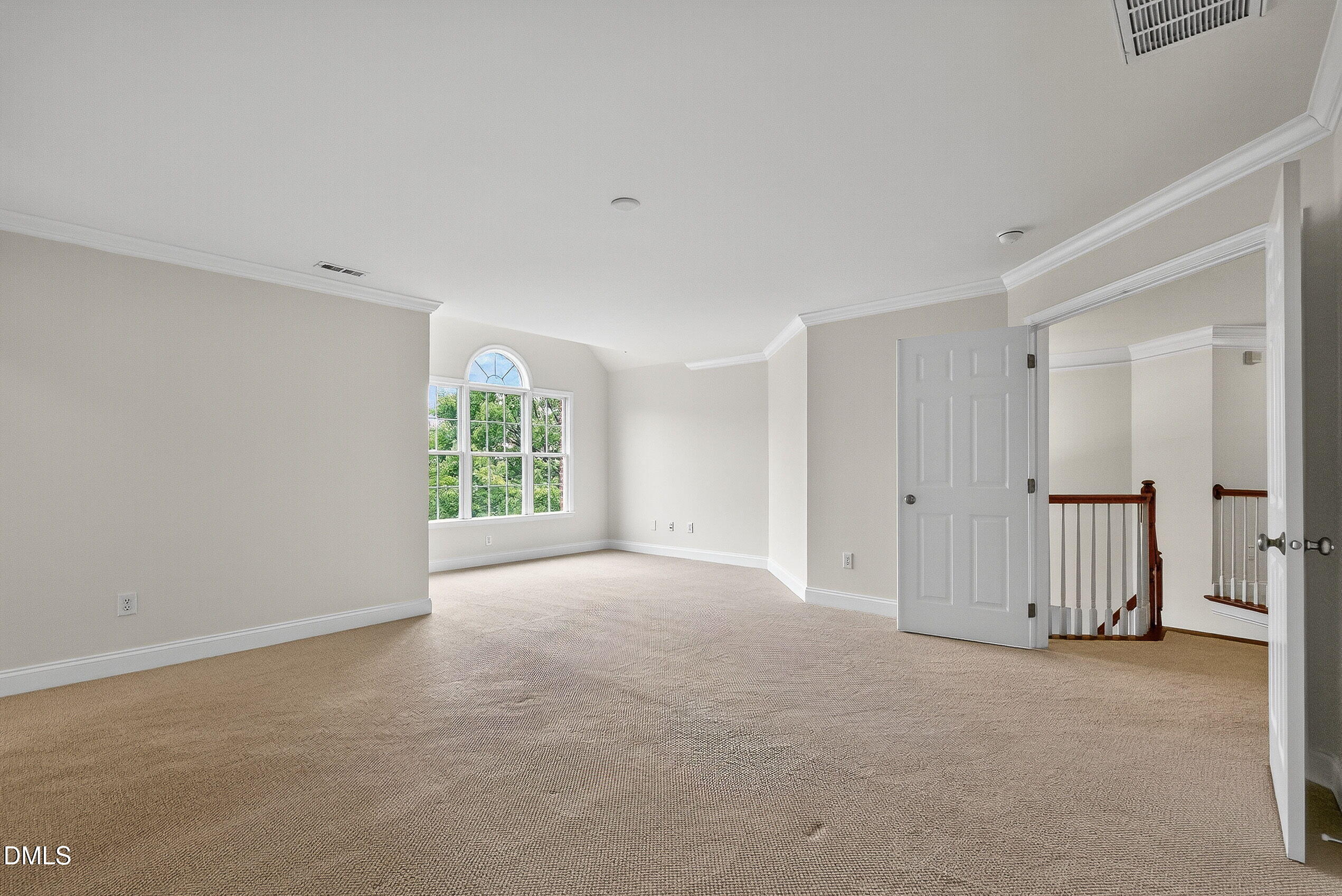 9441 Collingdale Way Raleigh, NC 27617 - Photo 26 of 54 a view of an empty room with a window