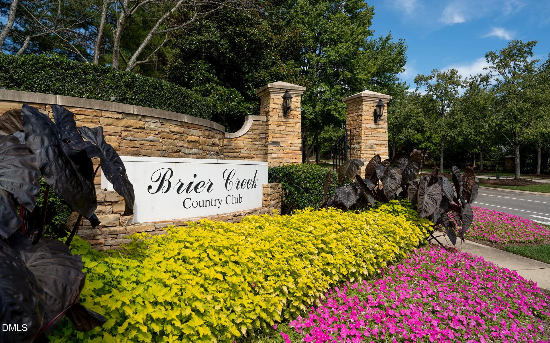 9441 Collingdale Way Raleigh, NC 27617 - Photo 44 of 54 a sign on the side of a building