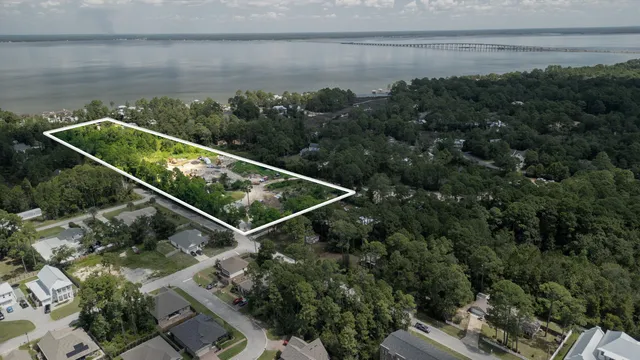 a view of a lake with a yard