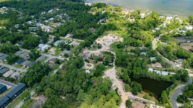 a view of a house with a tree