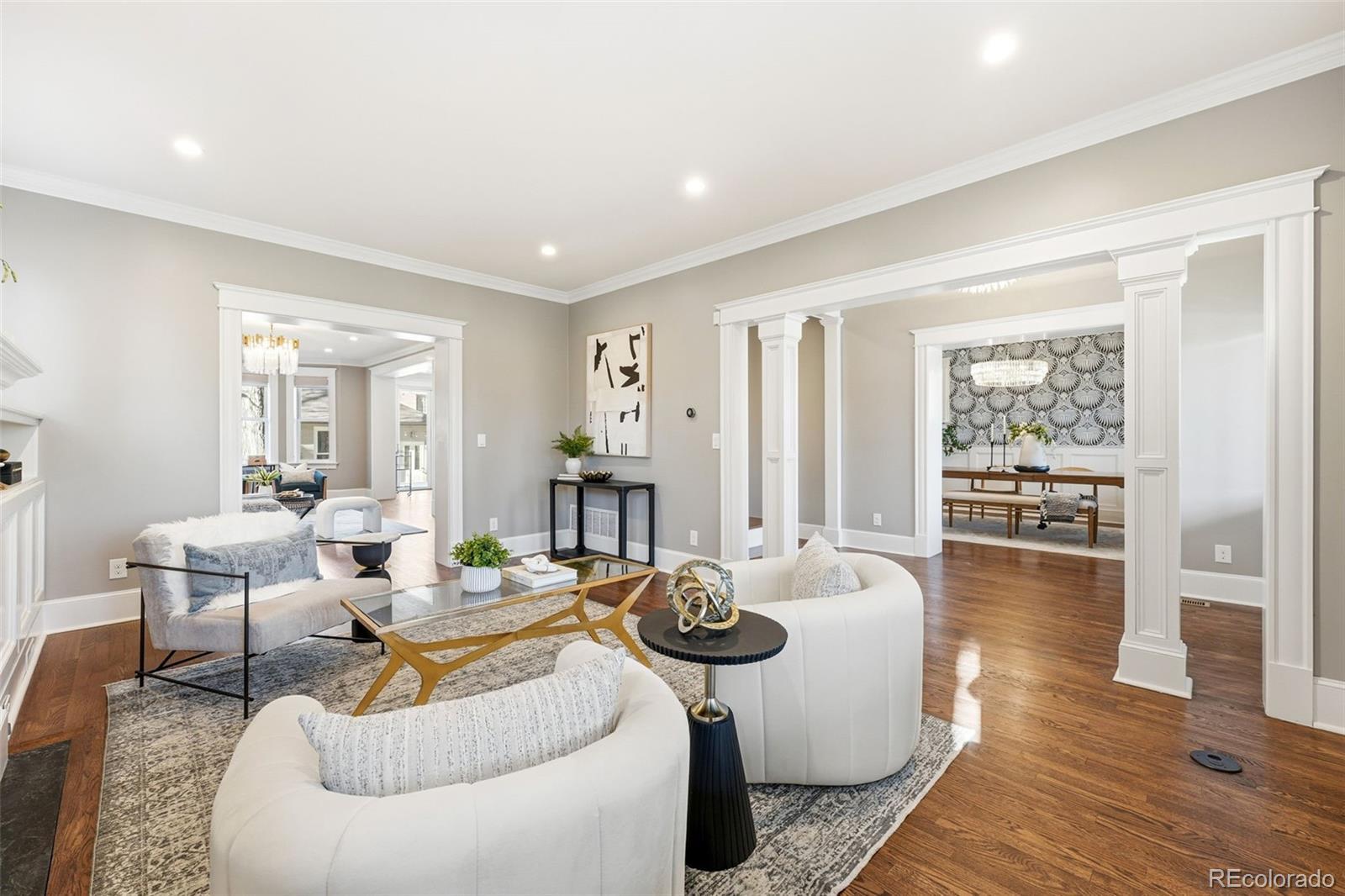 1257 Fillmore Street Denver, CO 80206 - Photo 11 of 50 a living room with furniture a wooden floor and next to a window
