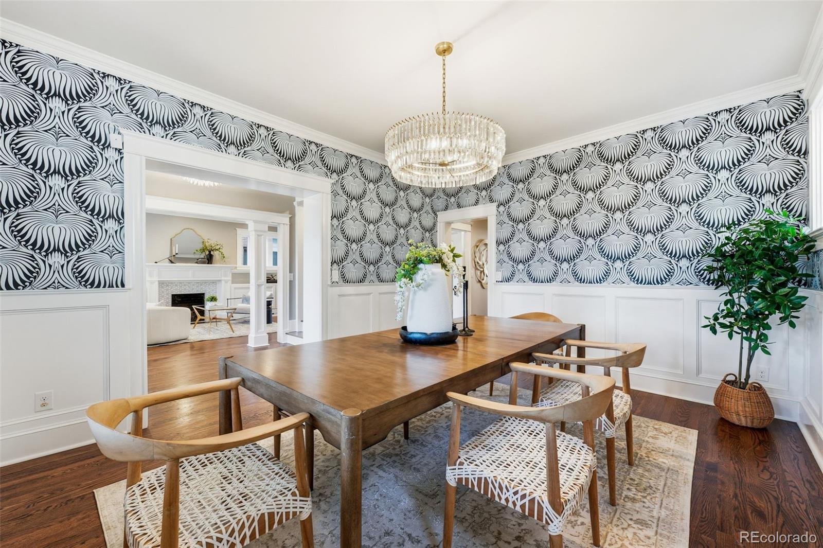 1257 Fillmore Street Denver, CO 80206 - Photo 20 of 50 a view of a dining room with furniture and wooden floor