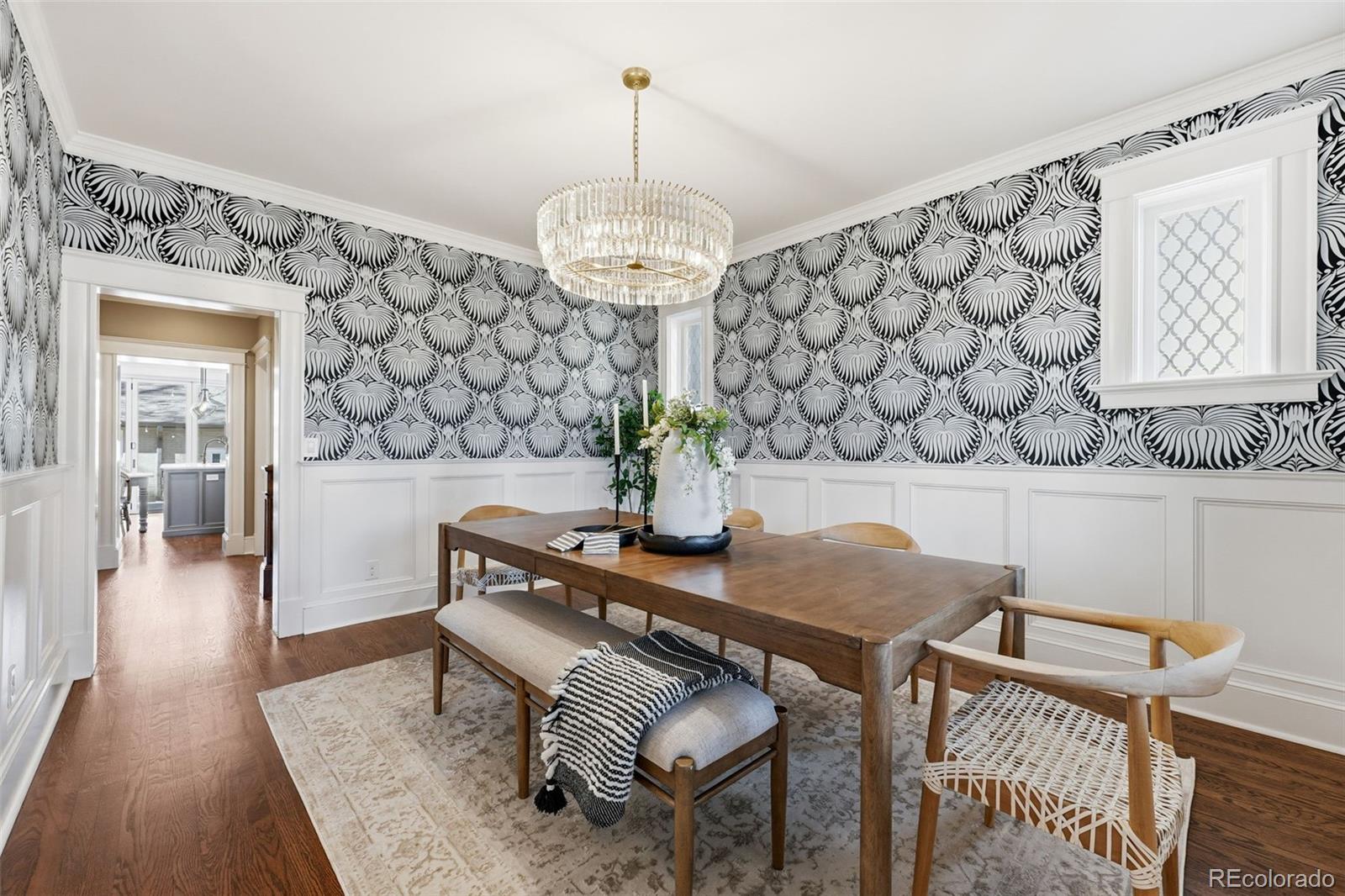 1257 Fillmore Street Denver, CO 80206 - Photo 21 of 50 a view of a dining room with furniture and wooden floor