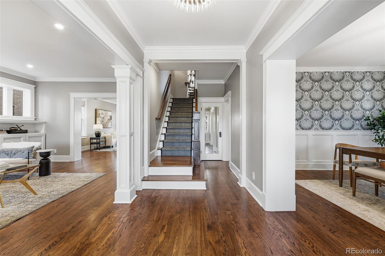 1257 Fillmore Street Denver, CO 80206 - Photo 23 of 50 a view of a hallway view with wooden floor and furniture
