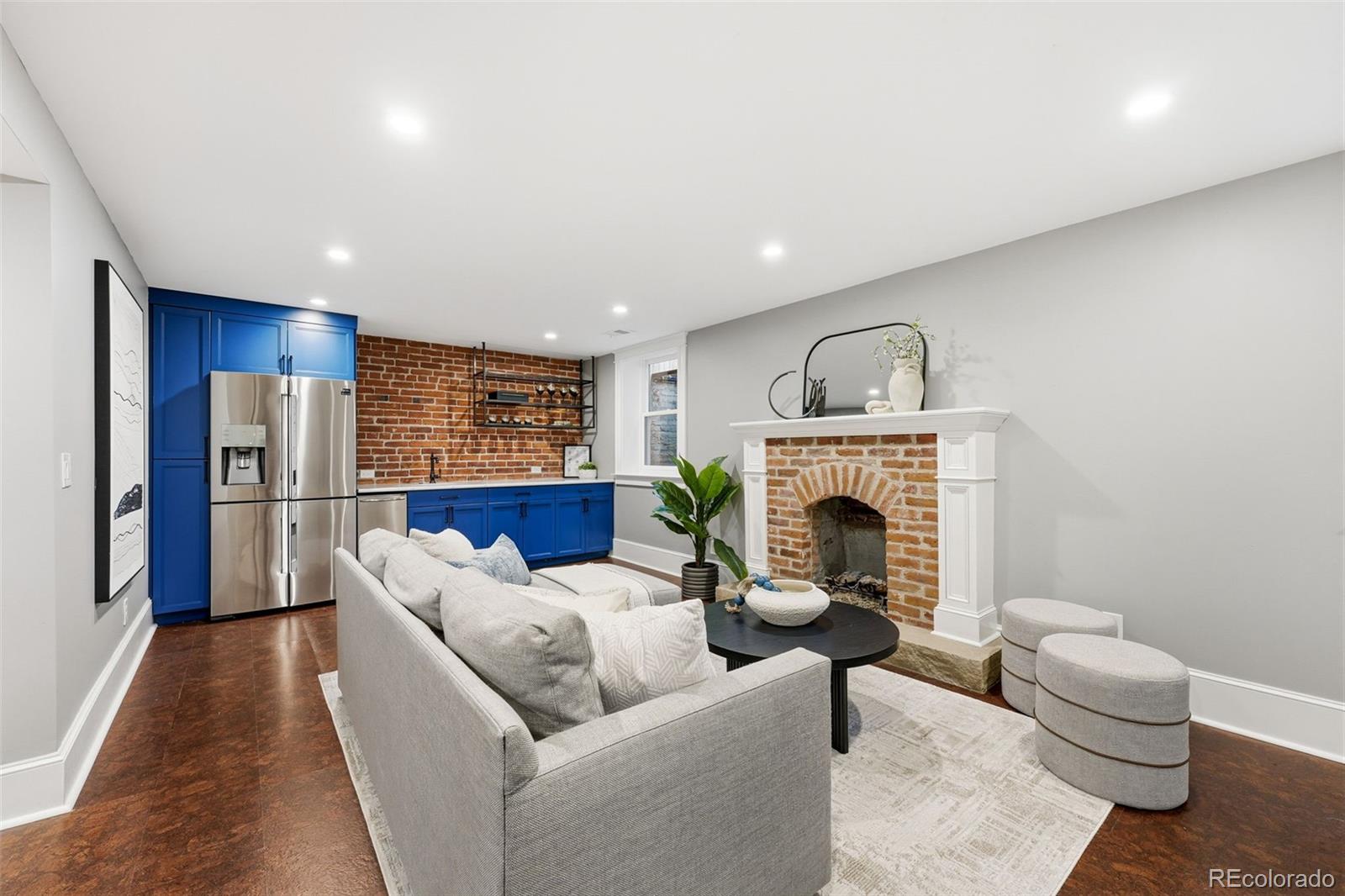 1257 Fillmore Street Denver, CO 80206 - Photo 40 of 50 a living room with furniture and a fireplace