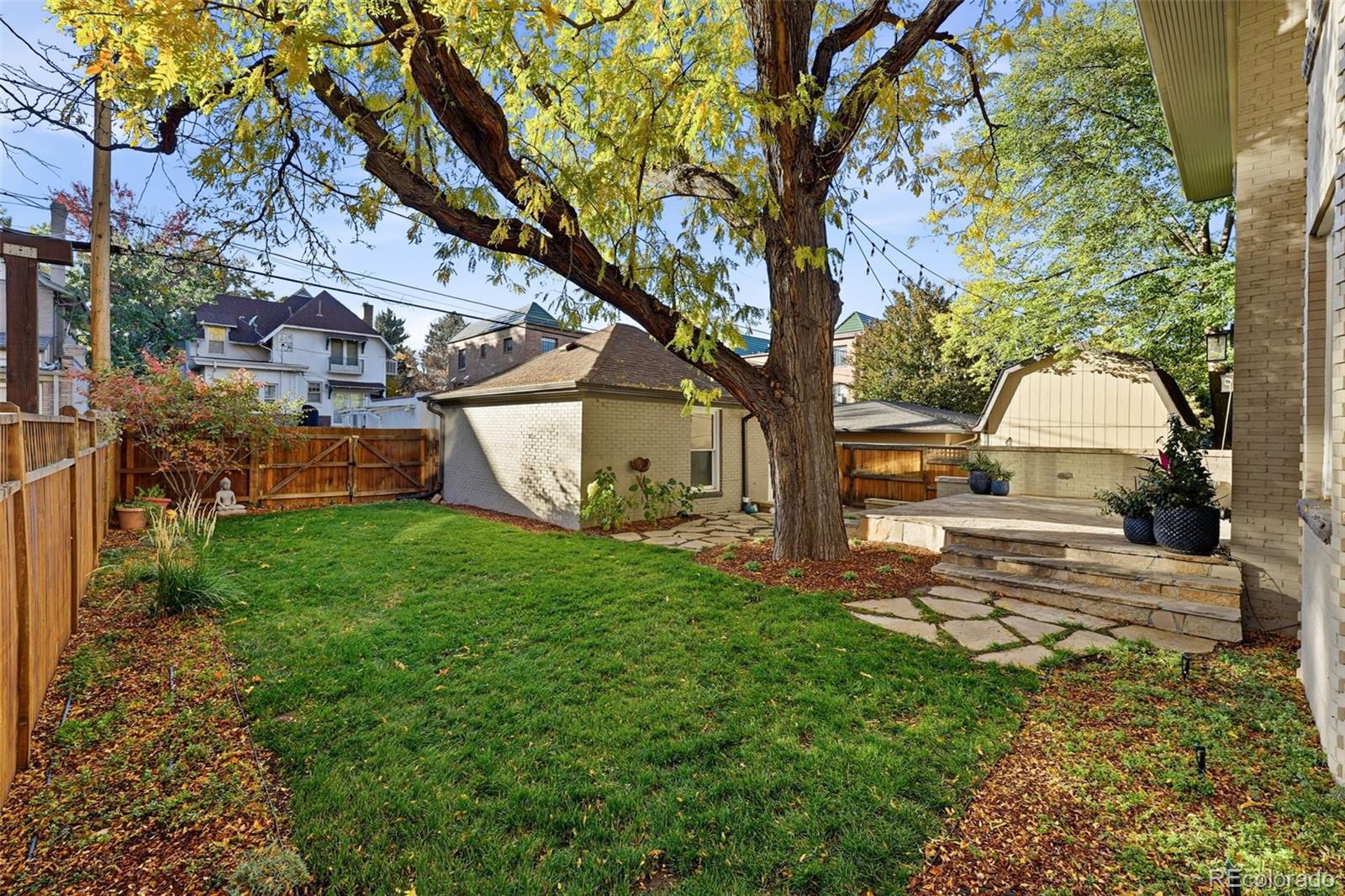 1257 Fillmore Street Denver, CO 80206 - Photo 50 of 50 a view of a house with backyard