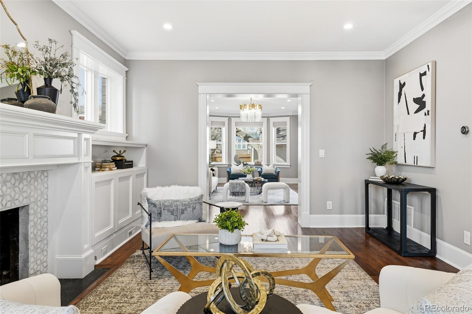 1257 Fillmore Street Denver, CO 80206 - Photo 6 of 50 a living room with furniture and a fireplace
