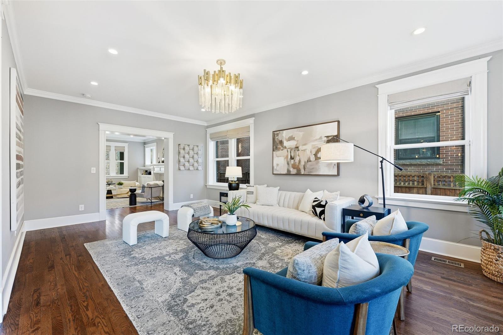 1257 Fillmore Street Denver, CO 80206 - Photo 9 of 50 a living room with furniture and a large window