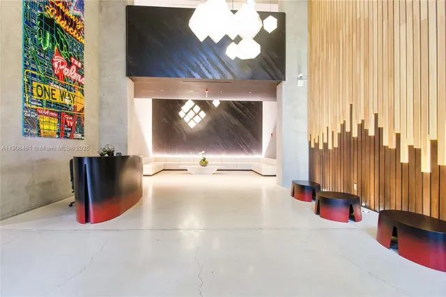 a view of a living room with a flat screen tv