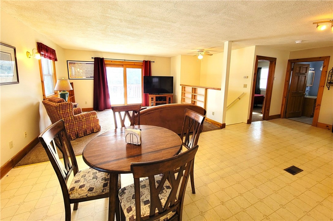3945 Lake Avenue Hector, NY 14818 - Photo 11 of 27 Kitchen Looking Into The Main Floor Living Room.