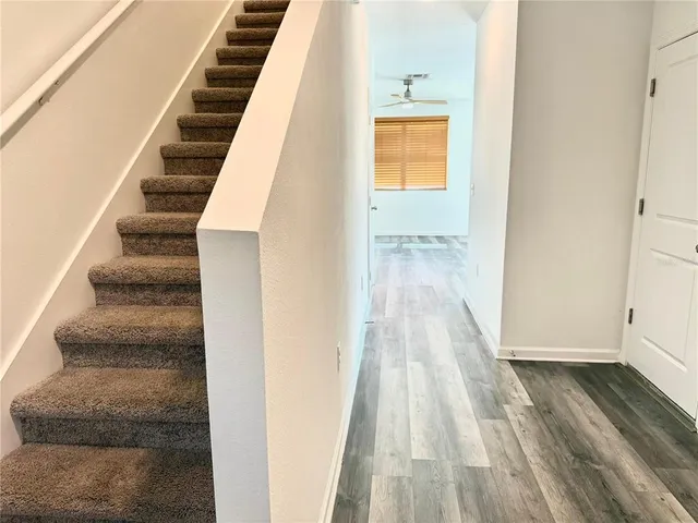 a view of a kitchen from the hallway