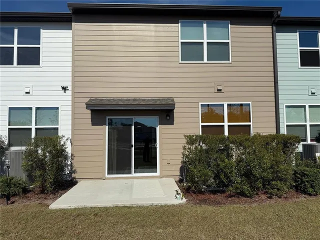 a view of storage and utility room with racks on the wall