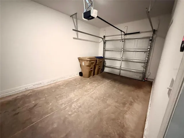 a view of a hallway with a wooden floor