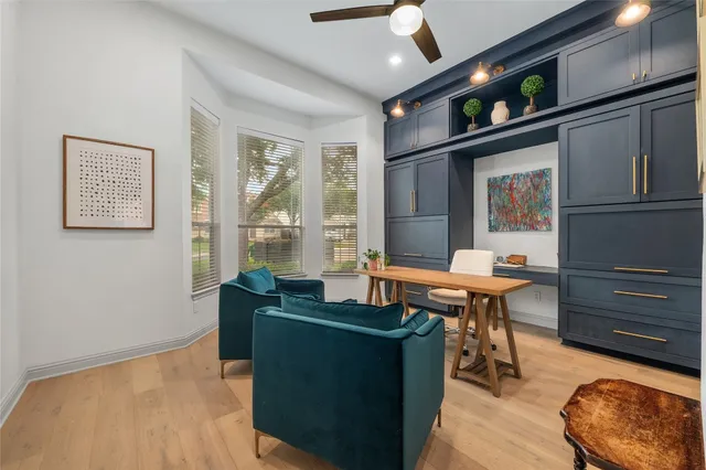 a view of a workspace with furniture