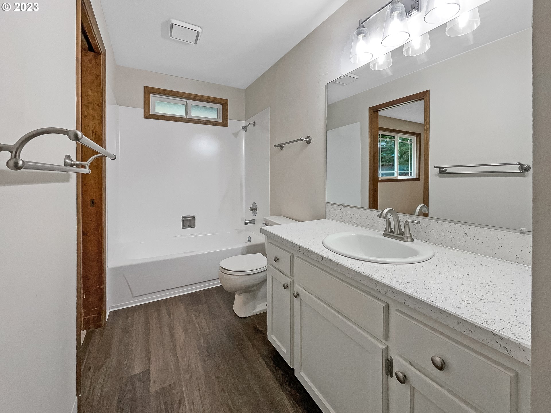 2120 Southwest 30th Drive Gresham, OR 97080 - Photo 8 of 17 a bathroom with a sink and a mirror