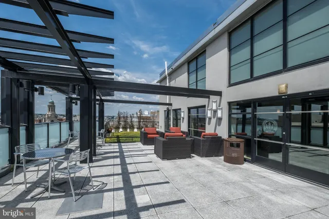 a view of living room filled with furniture