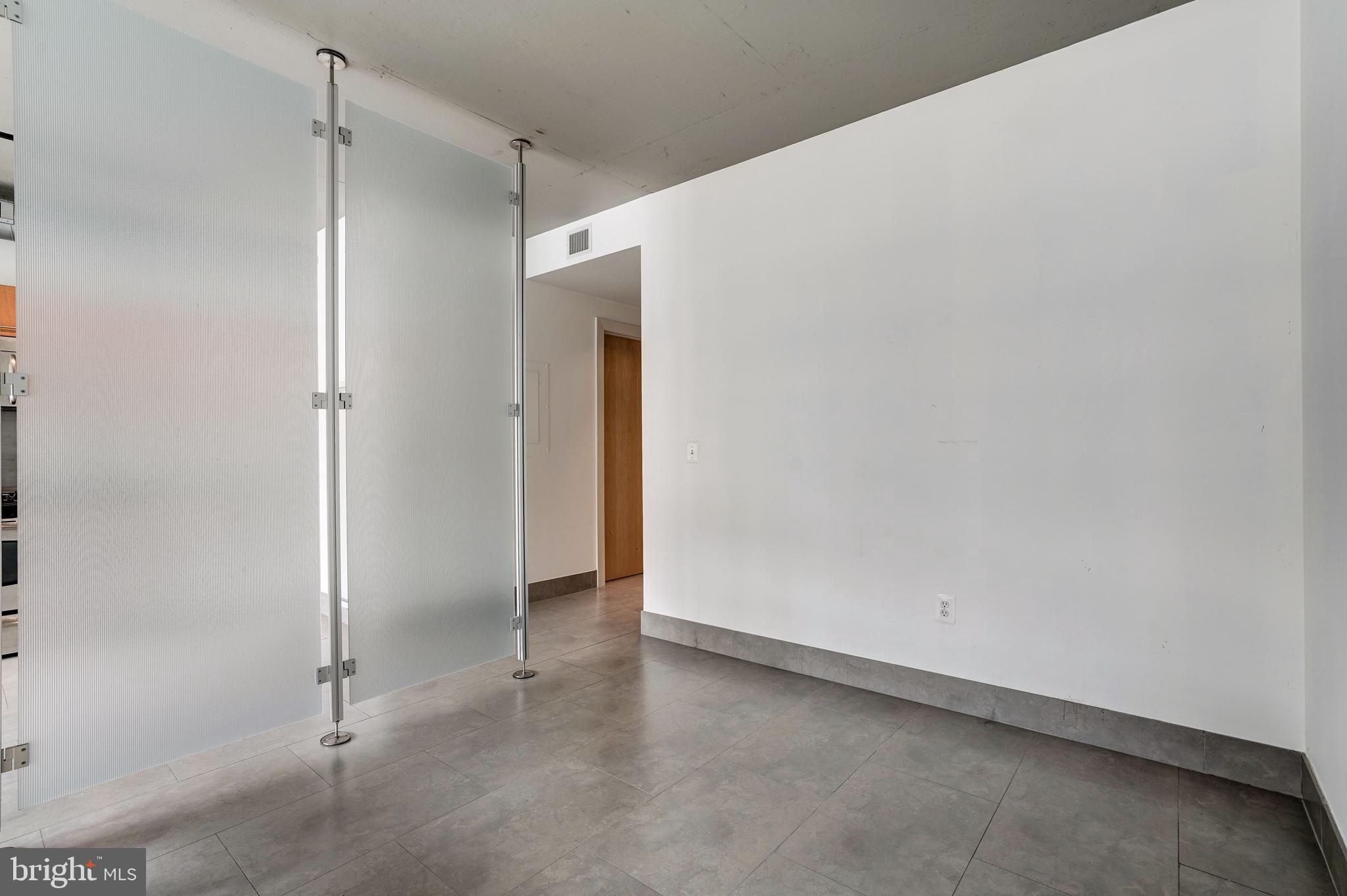 1133 14th Street Northwest, Unit 809 Washington, DC 20005 - Photo 9 of 27 a view of an empty room