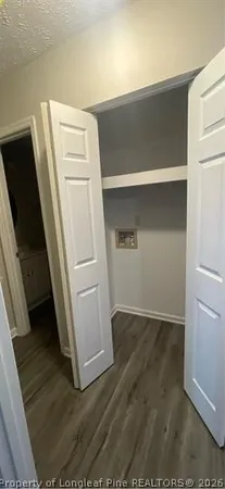 a view of an empty walk in closet