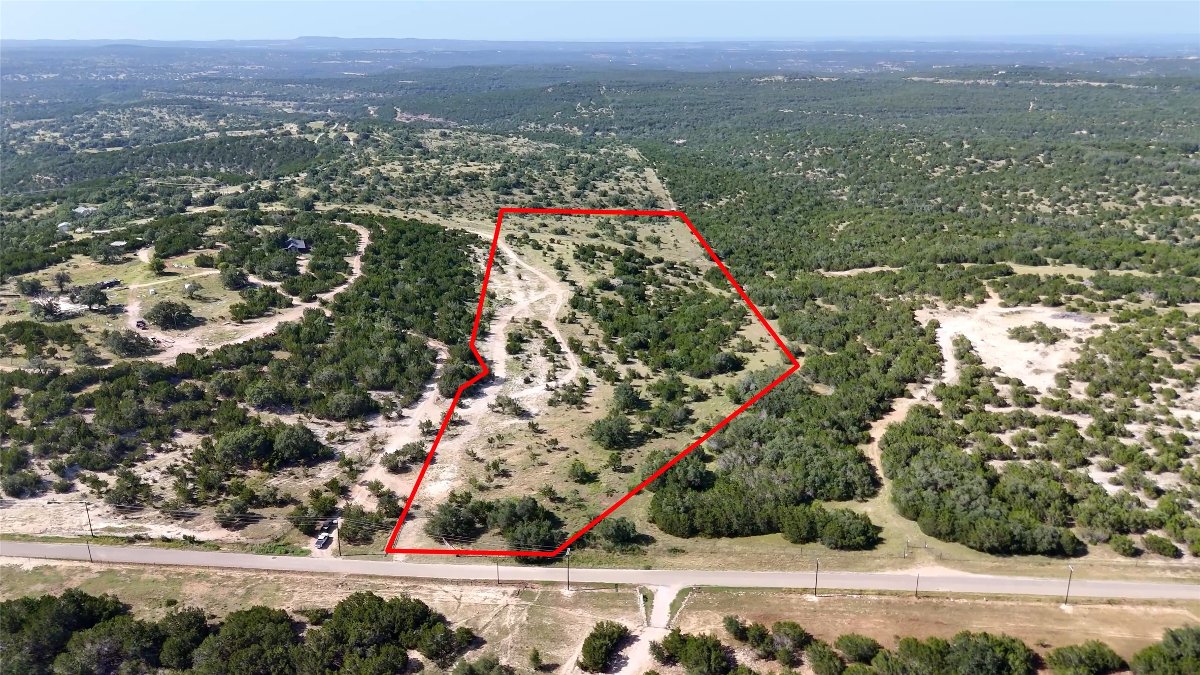 8364 West Fitzhugh Road Dripping Springs, TX 78620 - Photo 2 of 14 an aerial view of a city
