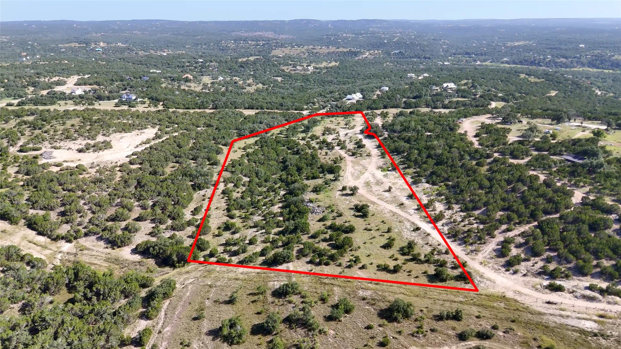 8364 West Fitzhugh Road Dripping Springs, TX 78620 - Photo 3 of 14 a view of a city with an ocean view