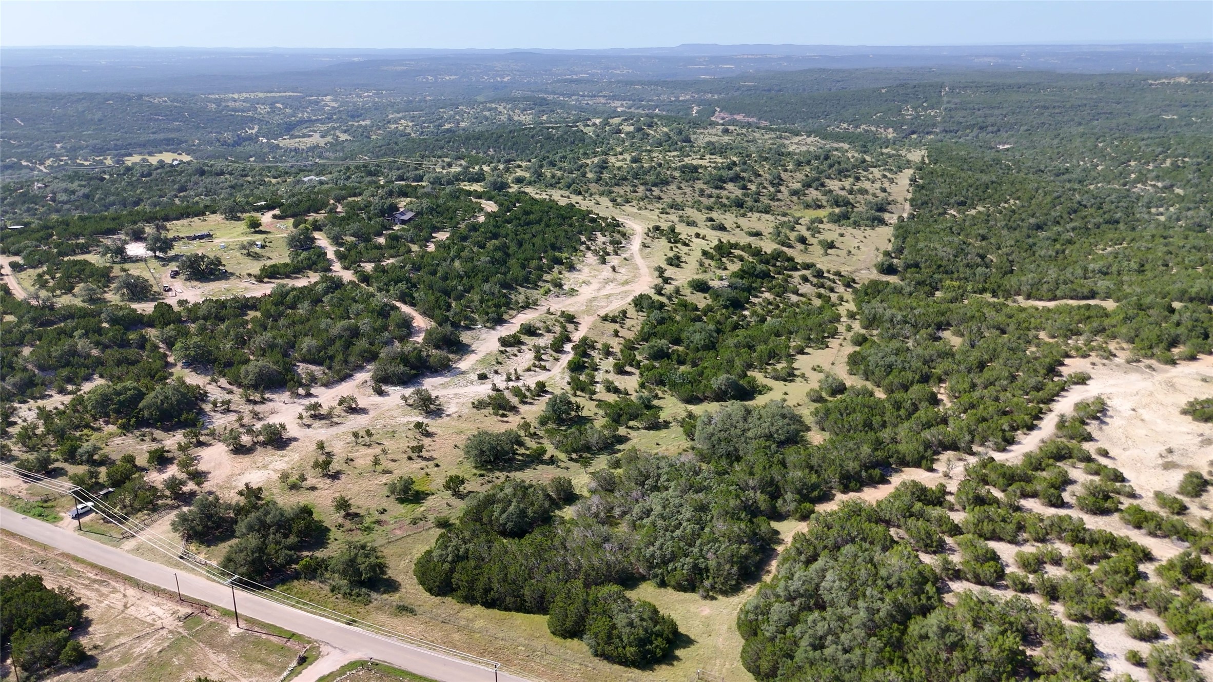 8364 West Fitzhugh Road Dripping Springs, TX 78620 - Photo 4 of 14 a view of a city with mountain view