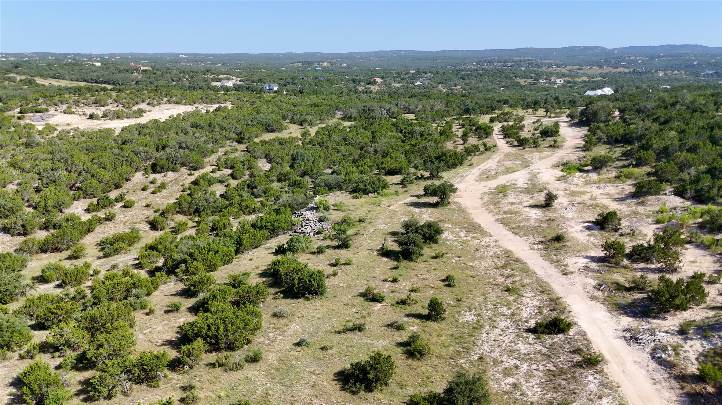 8364 West Fitzhugh Road Dripping Springs, TX 78620 - Photo 7 of 14 a view of a city with mountains in the background
