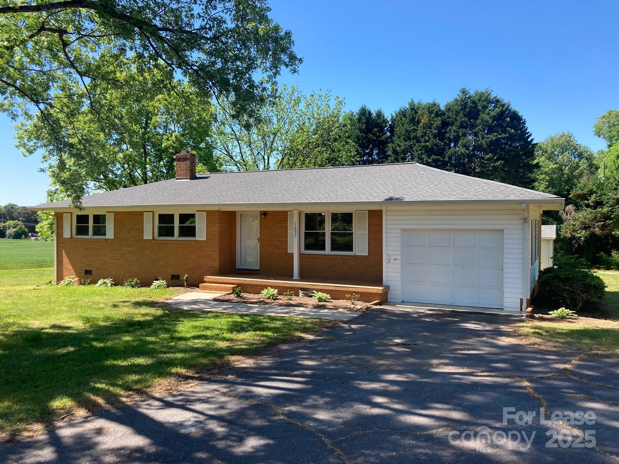 front view of a house and a yard