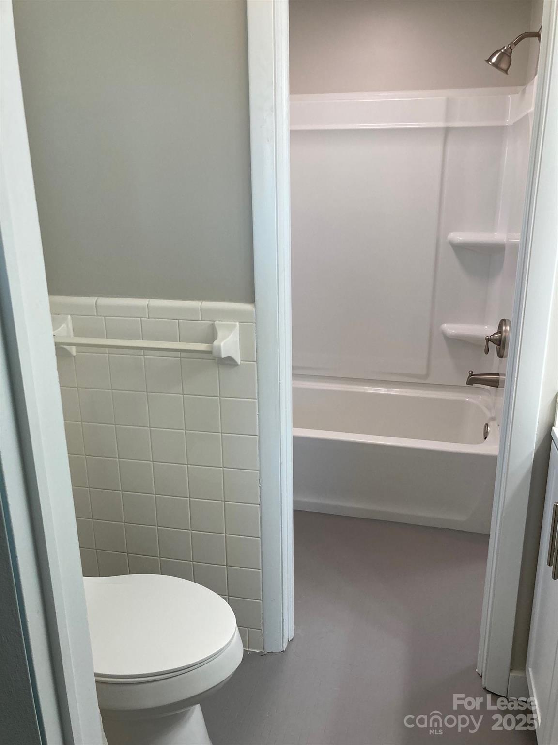 1697 Morningside Drive Newton, NC 28658 - Photo 17 of 22 a bathroom with a toilet and a shower