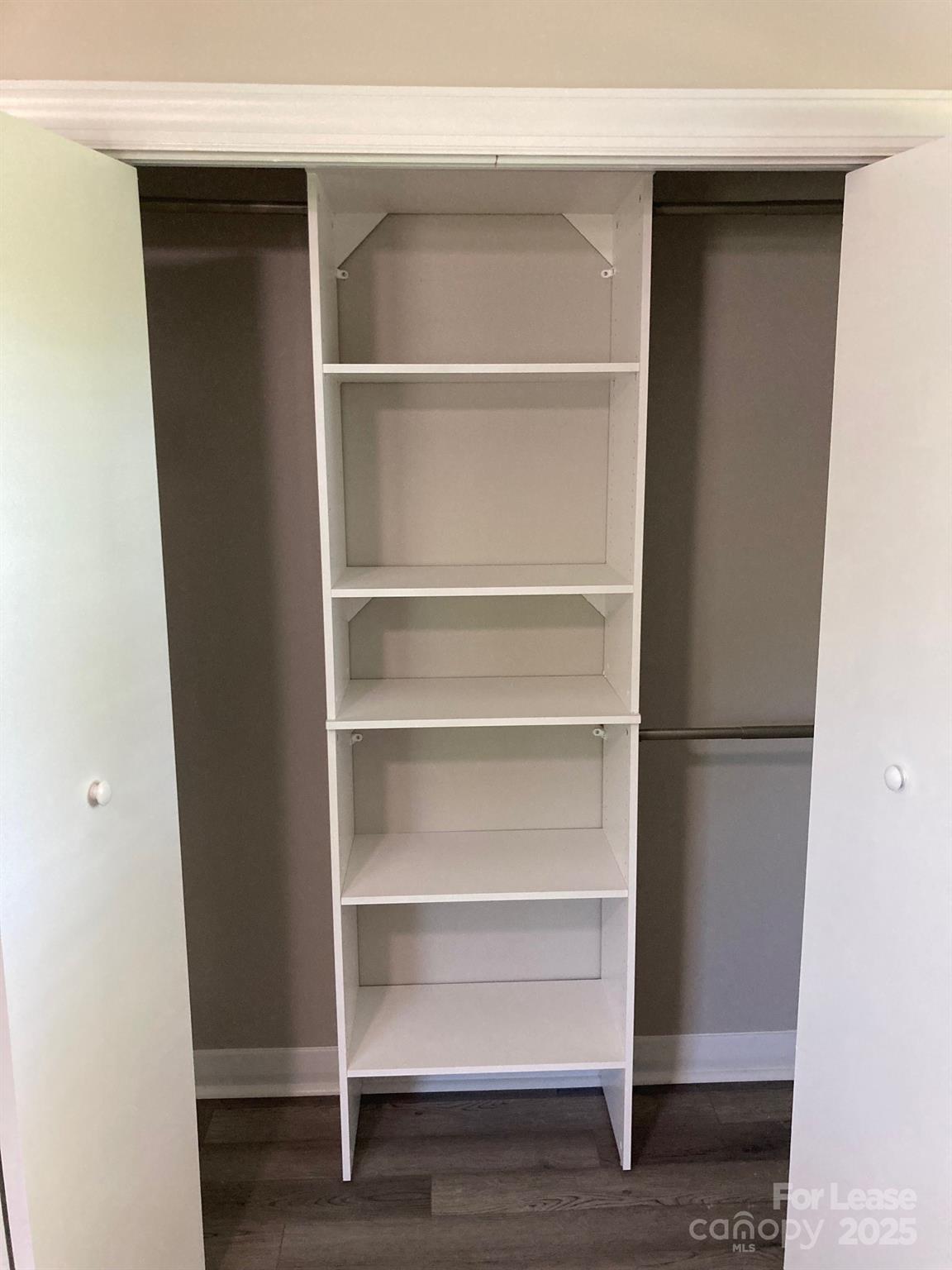 1697 Morningside Drive Newton, NC 28658 - Photo 20 of 22 a view of walk in closet with empty racks
