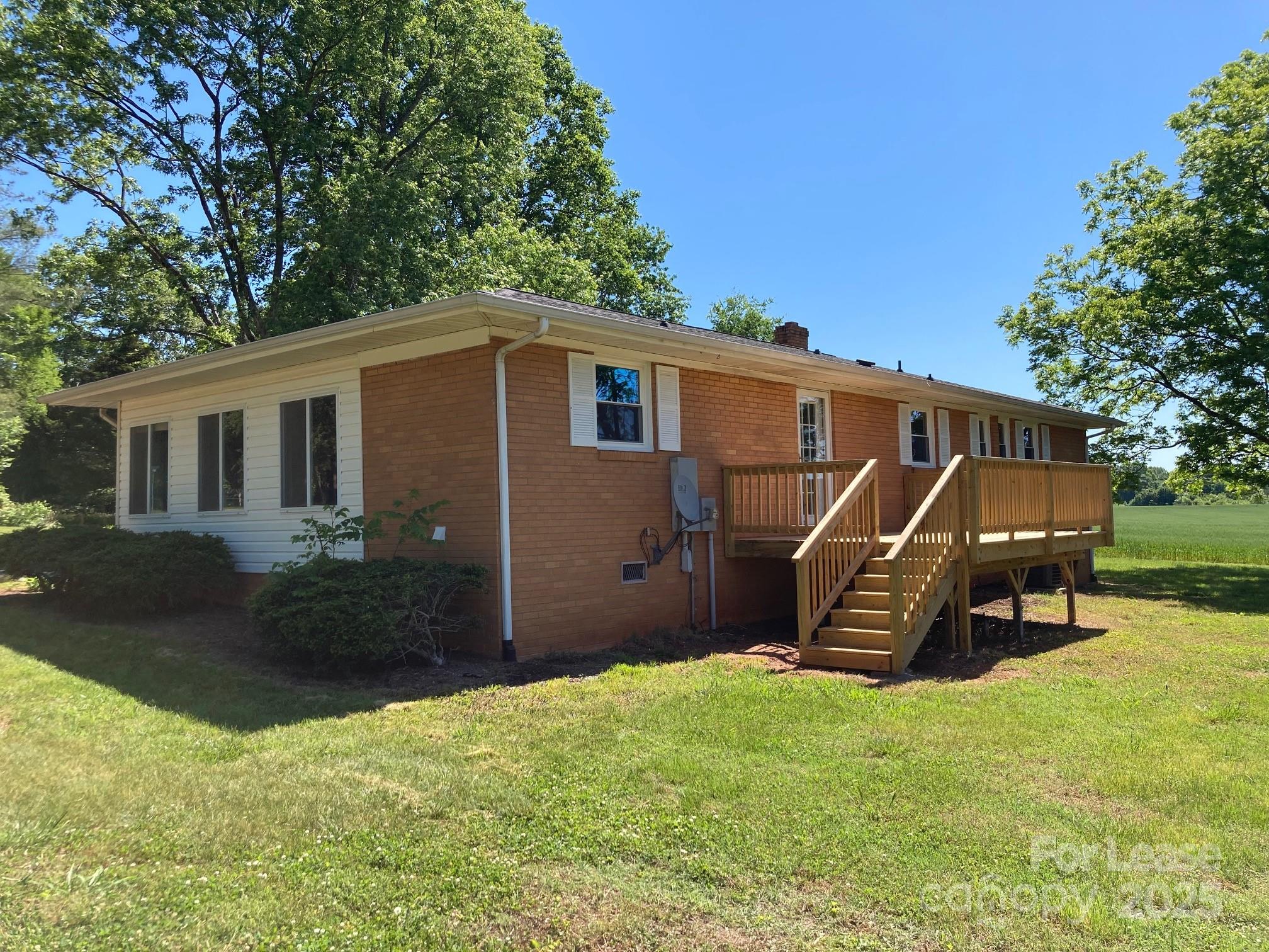 1697 Morningside Drive Newton, NC 28658 - Photo 4 of 22 a front view of a house with patio