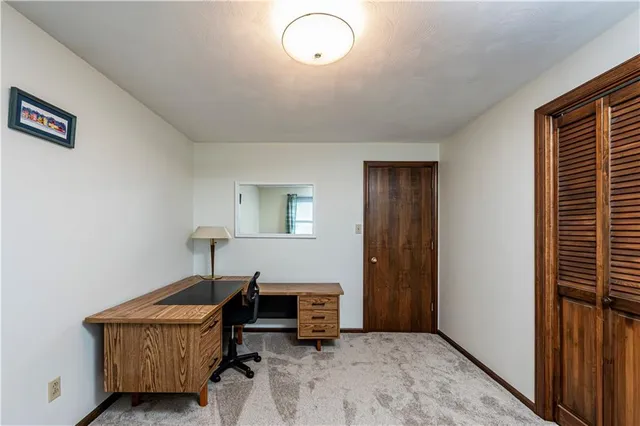 a room with furniture and a window