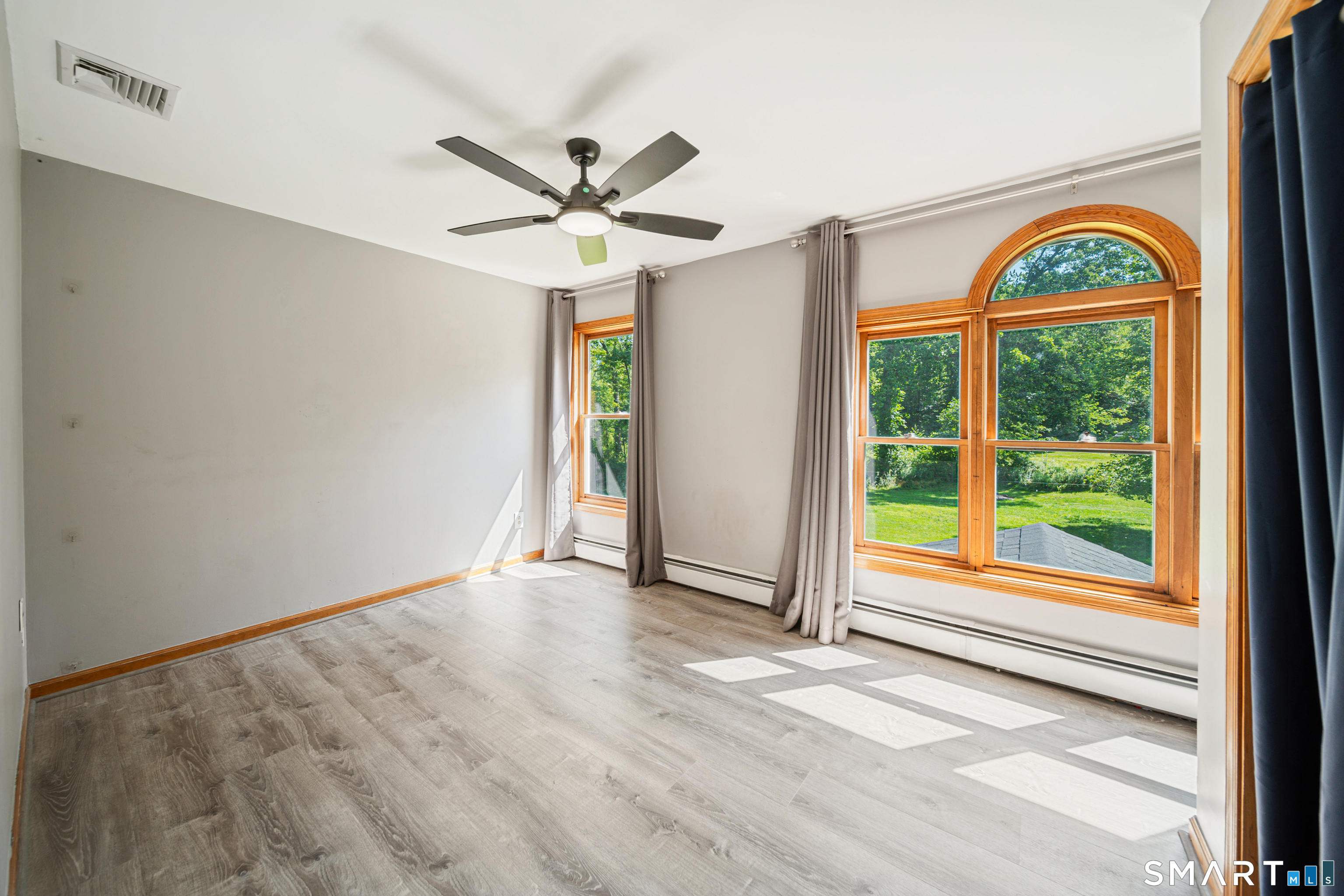225 Bethmour Road Bethany, CT 06524 - Photo 18 of 30 Bedroom 1 with beautiful large windows & also access to the walk-up attic space