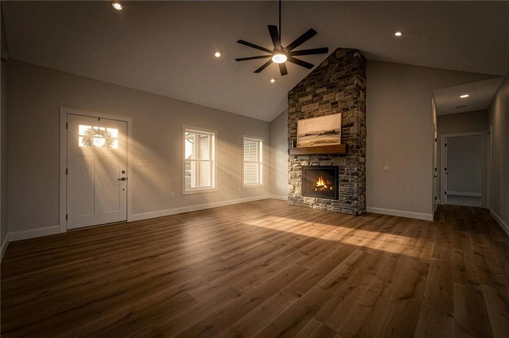 16 Margaret Street Uniontown, PA 15401 - Photo 19 of 50 an empty room with wooden floor fireplace and windows