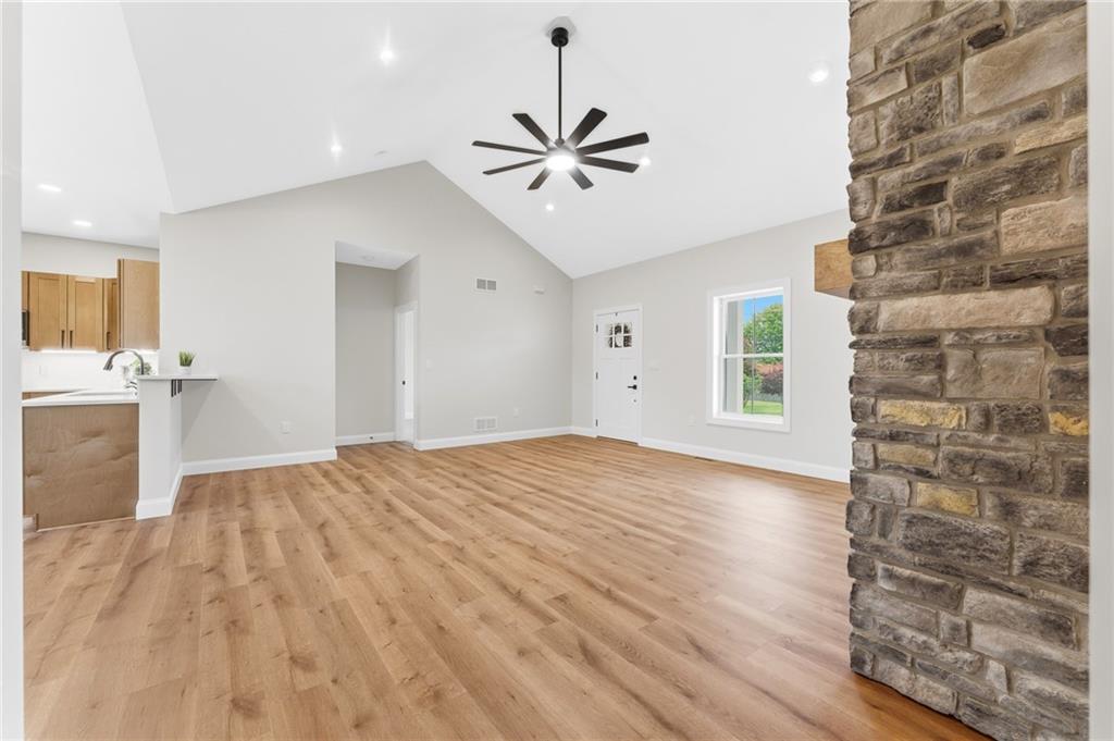 16 Margaret Street Uniontown, PA 15401 - Photo 21 of 50 a view of empty room with wooden floor and ceiling fan