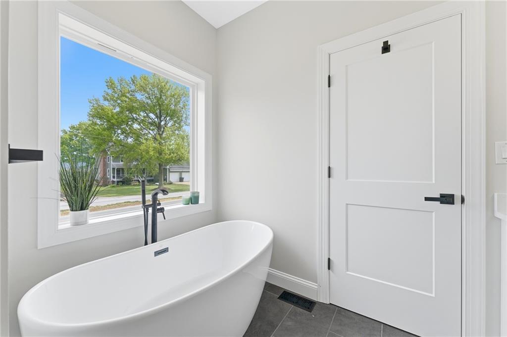 16 Margaret Street Uniontown, PA 15401 - Photo 37 of 50 a bathroom with a white tub