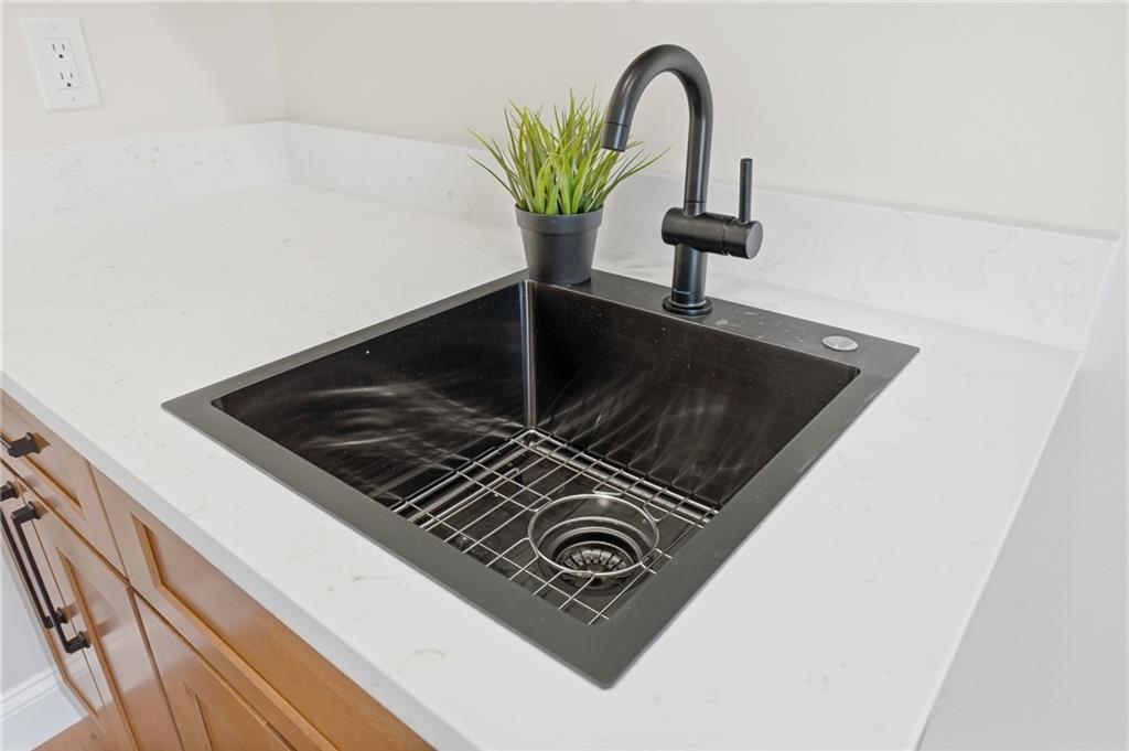 16 Margaret Street Uniontown, PA 15401 - Photo 44 of 50 a close view of a sink a counter space and utility room