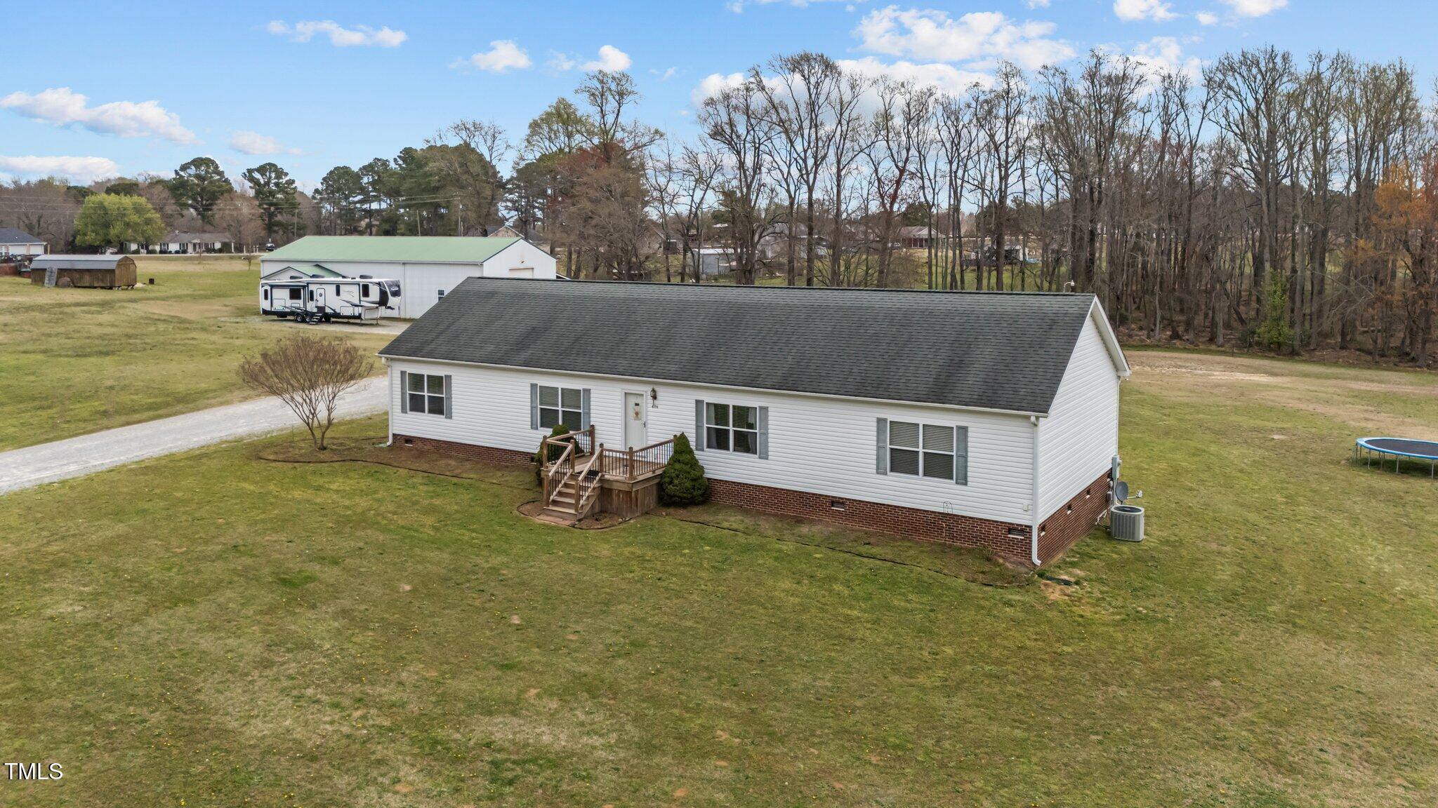4194 Abattoir Road Angier, NC 27501 - Photo 8 of 54 8-web-or-mls-DJI_20250321133138_0076_D