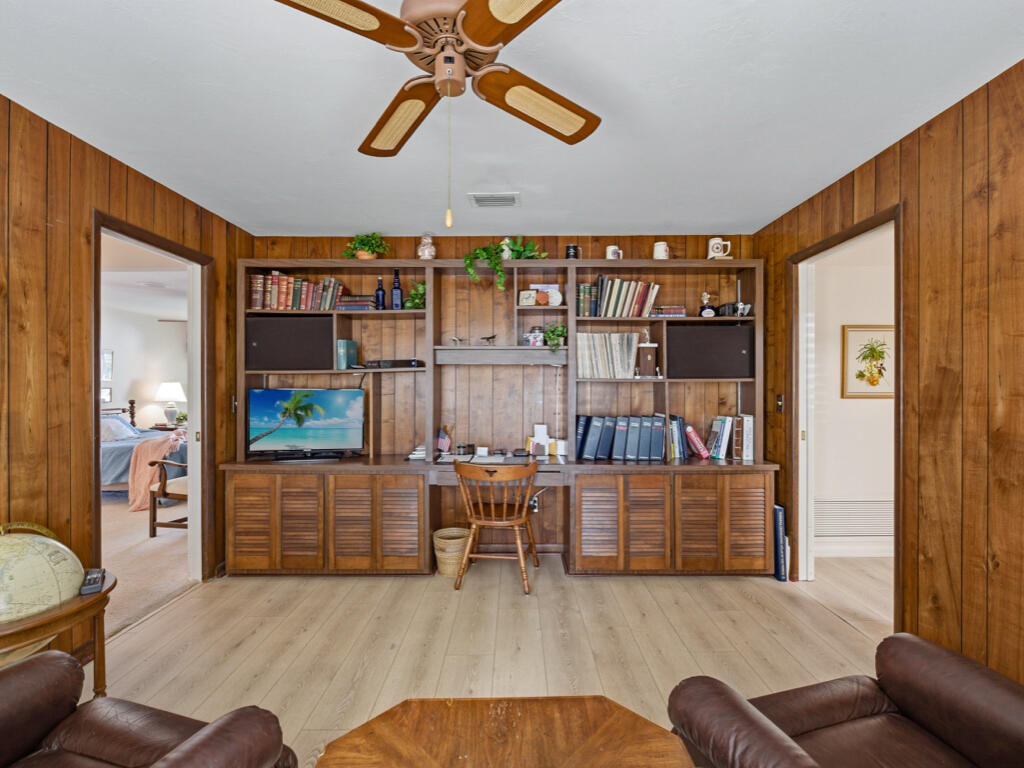 314 Torrey Pines Point Naples, FL 34113 - Photo 8 of 21 a living room with furniture and wooden floor