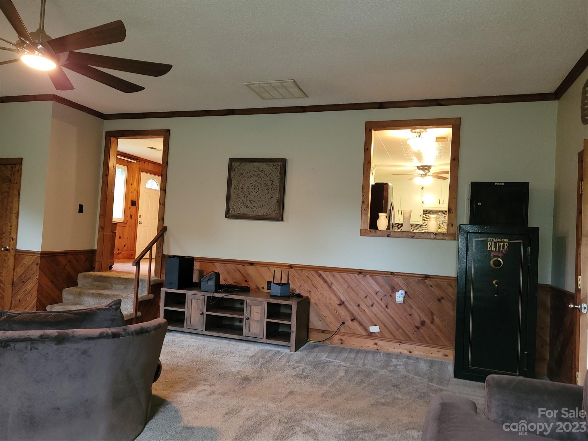 1740 Sells Road Salisbury, NC 28144 - Photo 11 of 22 a living room with furniture a ceiling fan and a window