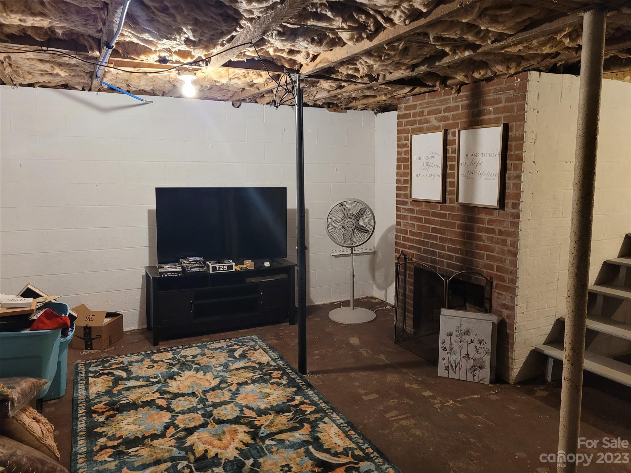 1740 Sells Road Salisbury, NC 28144 - Photo 19 of 22 a bedroom with a bed and a fireplace