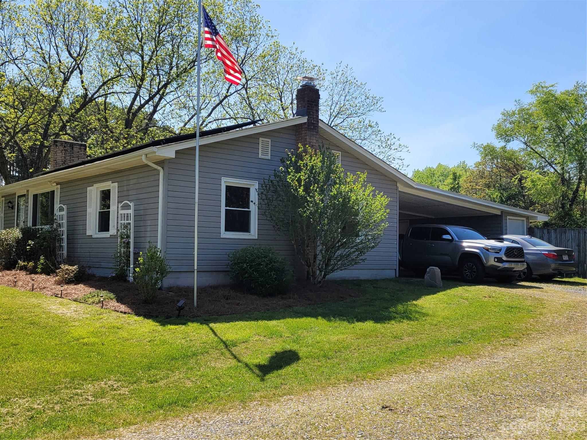1740 Sells Road Salisbury, NC 28144 - Photo 2 of 22 a view of a house with backyard