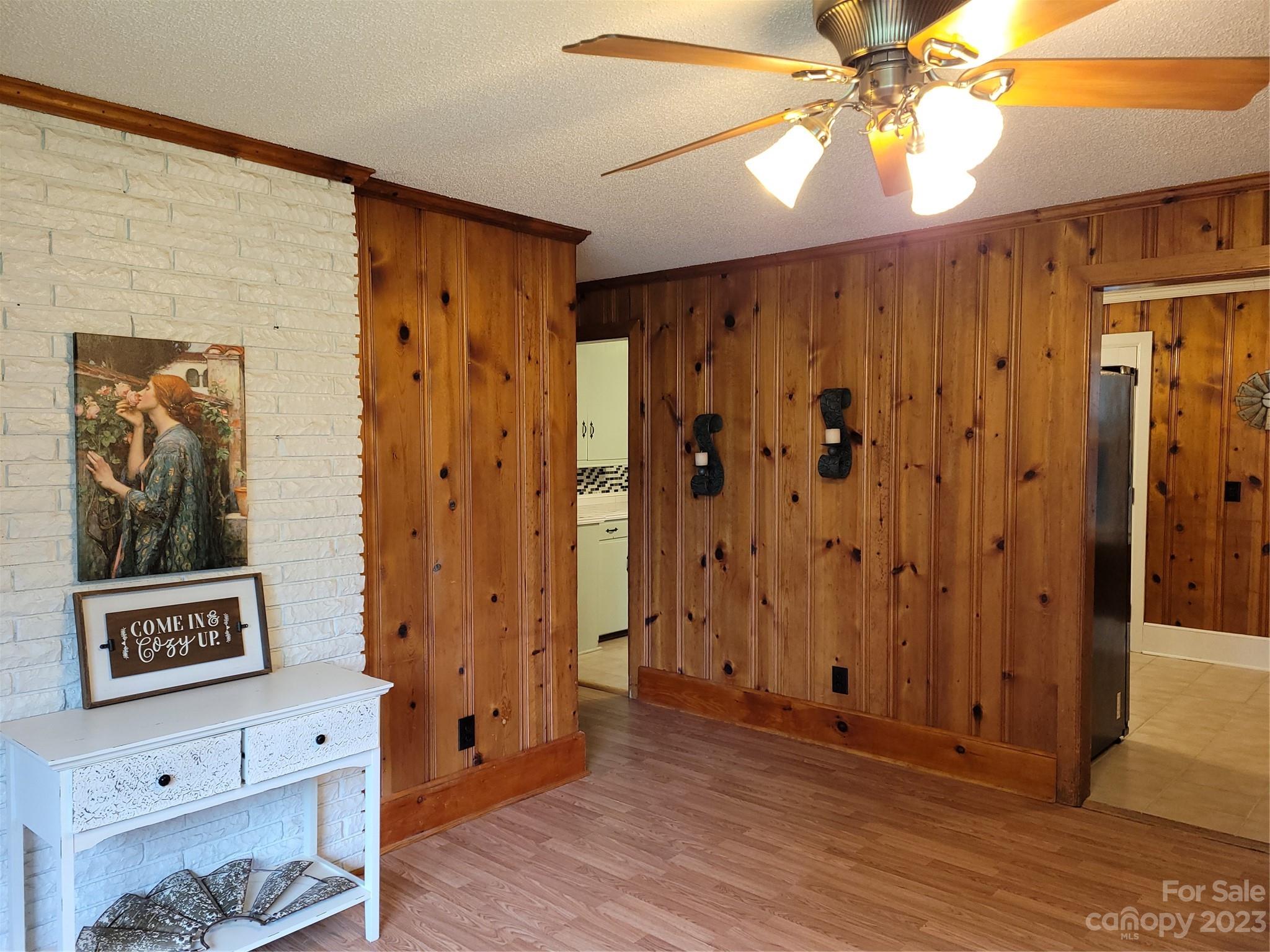 1740 Sells Road Salisbury, NC 28144 - Photo 8 of 22 a view of a hallway with wooden floor and closet
