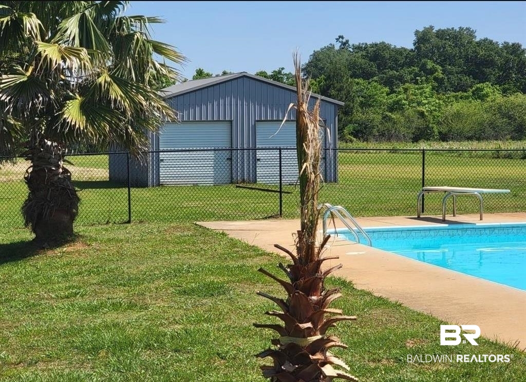 16311 Old Brady Road Bay Minette, AL 36507 - Photo 16 of 38 Outdoor swimming pool with concrete surround