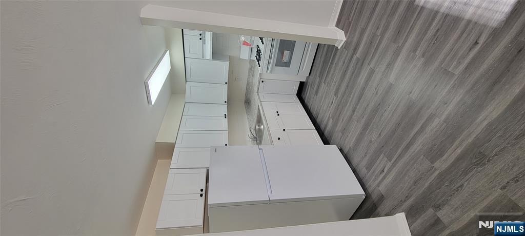 960 Main Street, Unit 4 Hackensack, NJ 07601 - Photo 2 of 3 a room with storage and utility