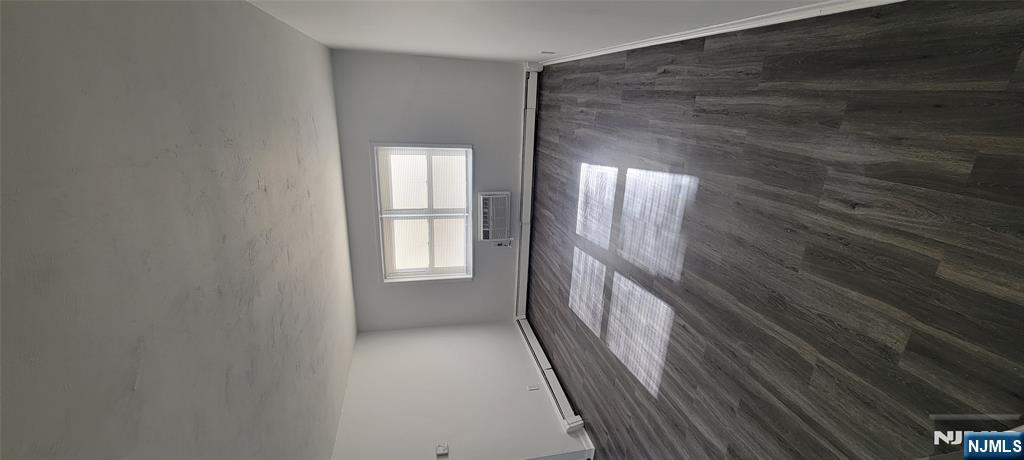 960 Main Street, Unit 4 Hackensack, NJ 07601 - Photo 3 of 3 a view of an empty room and window