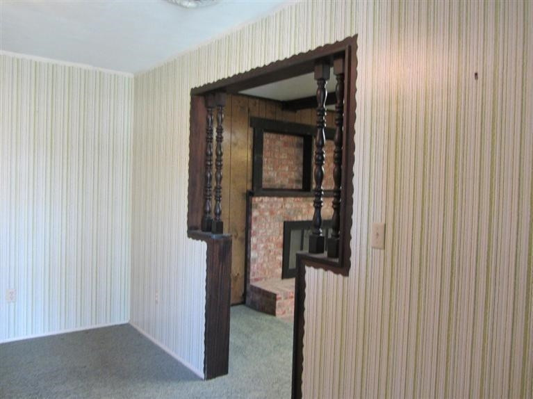 1412 Ave L Ralls, TX 79357 - Photo 5 of 10 a way to rooms with wooden door