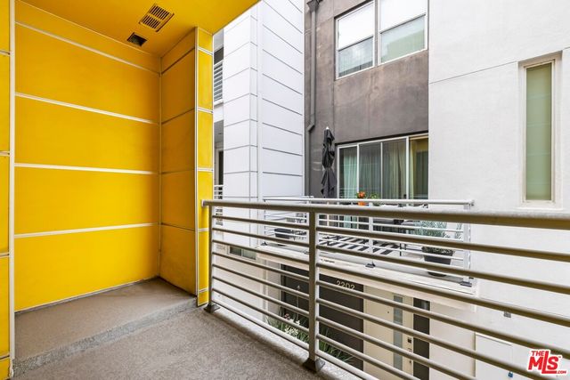 a view of a door and wooden floor