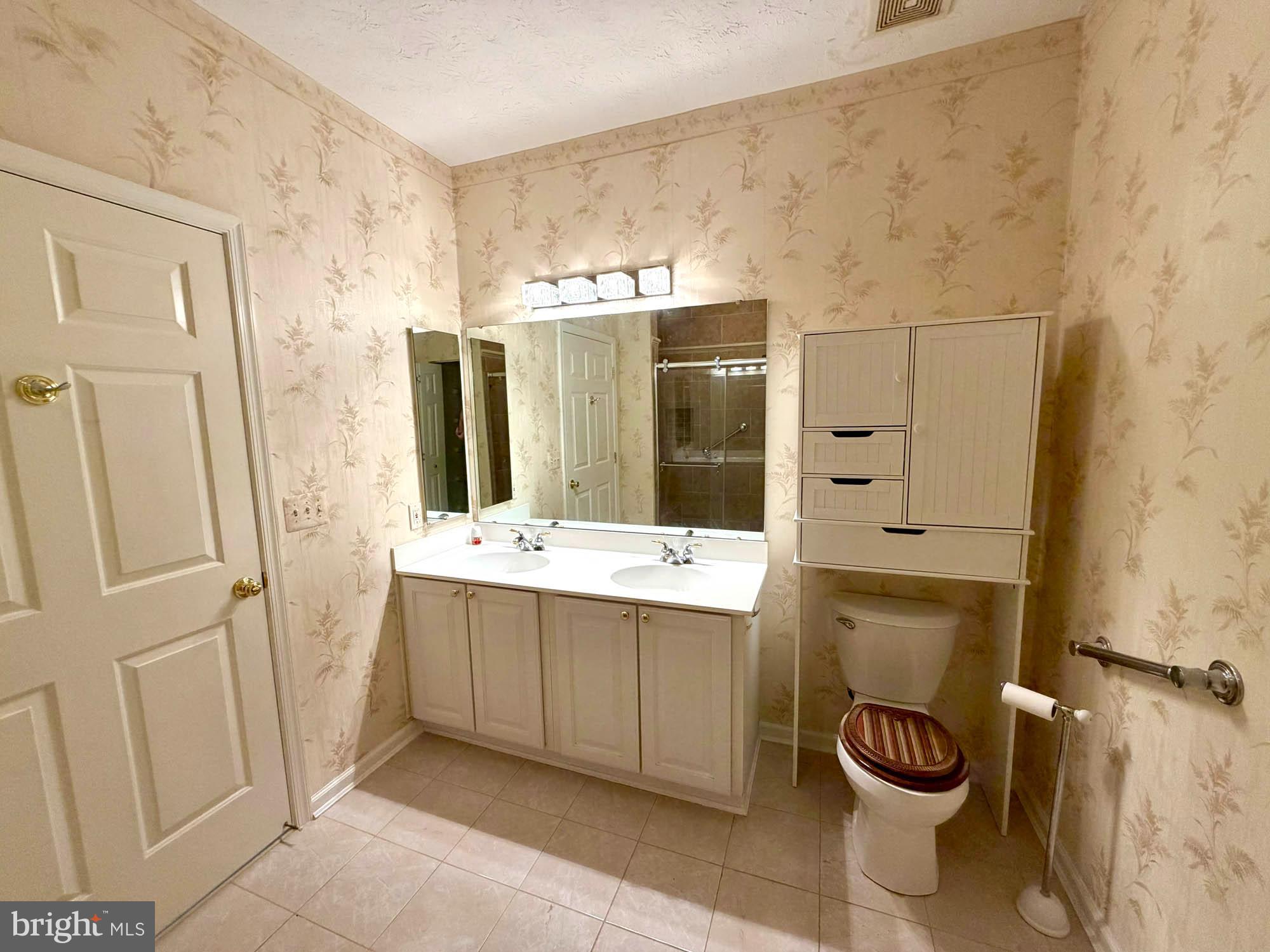4501 Talcott Terrace, Unit 4501P Perry Hall, MD 21128 - Photo 16 of 21 a bathroom with a sink and mirror