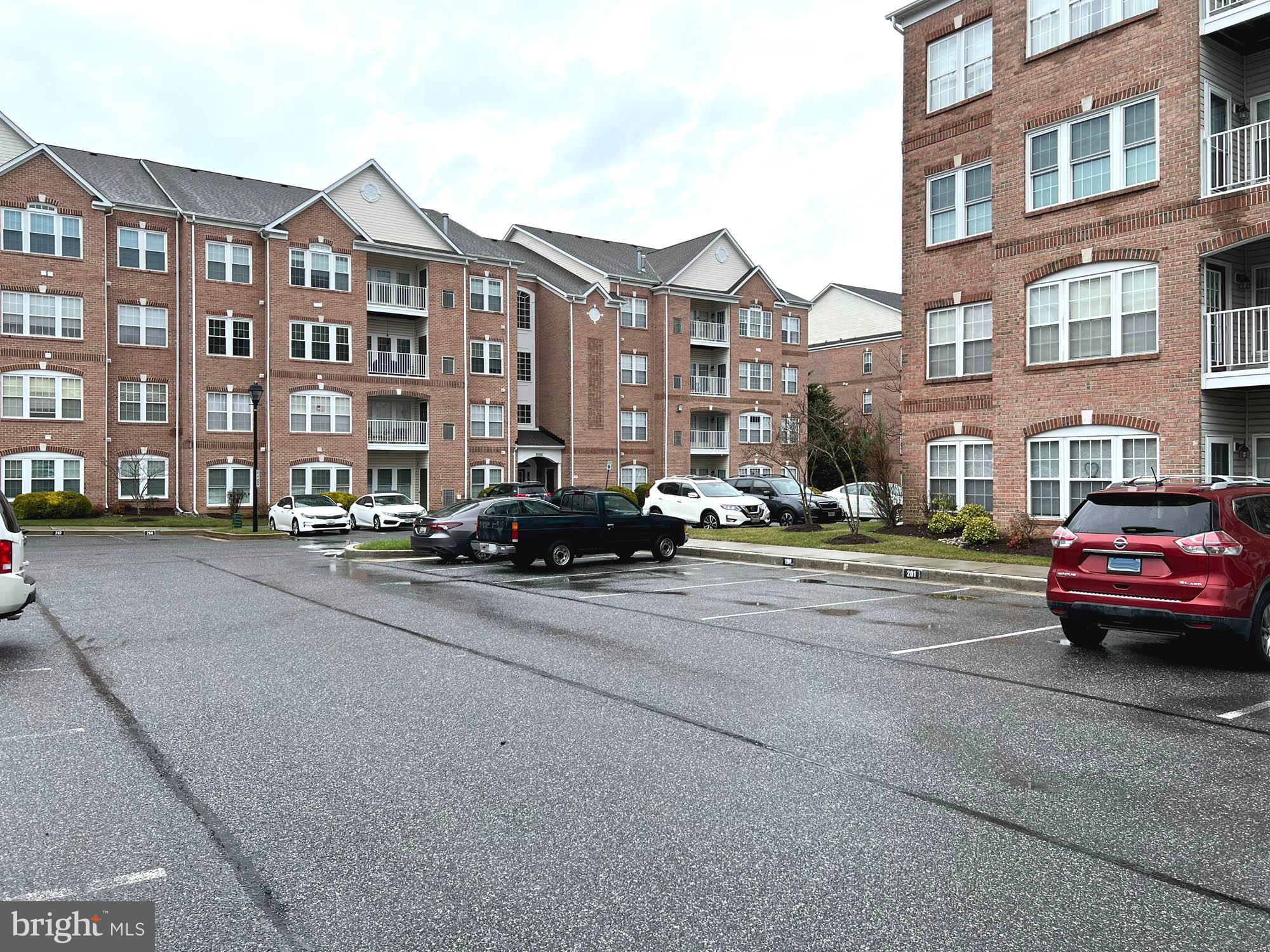 4501 Talcott Terrace, Unit 4501P Perry Hall, MD 21128 - Photo 20 of 21 a view of a street that has couple of cars parked on the road