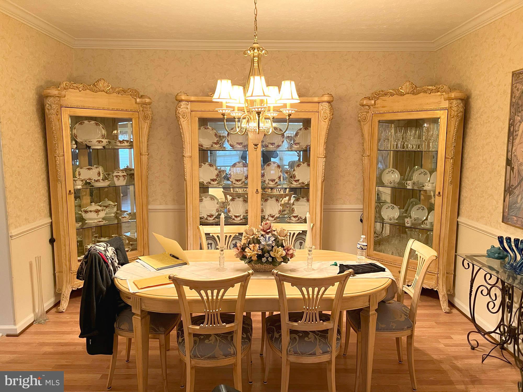 4501 Talcott Terrace, Unit 4501P Perry Hall, MD 21128 - Photo 5 of 21 a view of a dining room with furniture and chandelier